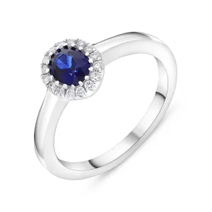 18ct White Gold 0.53ct Sapphire 0.08ct Diamond Oval Cluster Ring