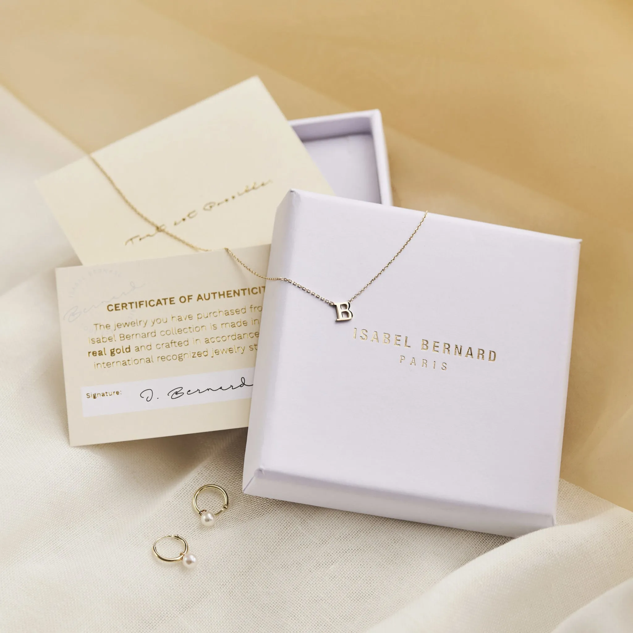Cadeau d'Isabel 14 karat white gold necklace & bracelet with zirconia