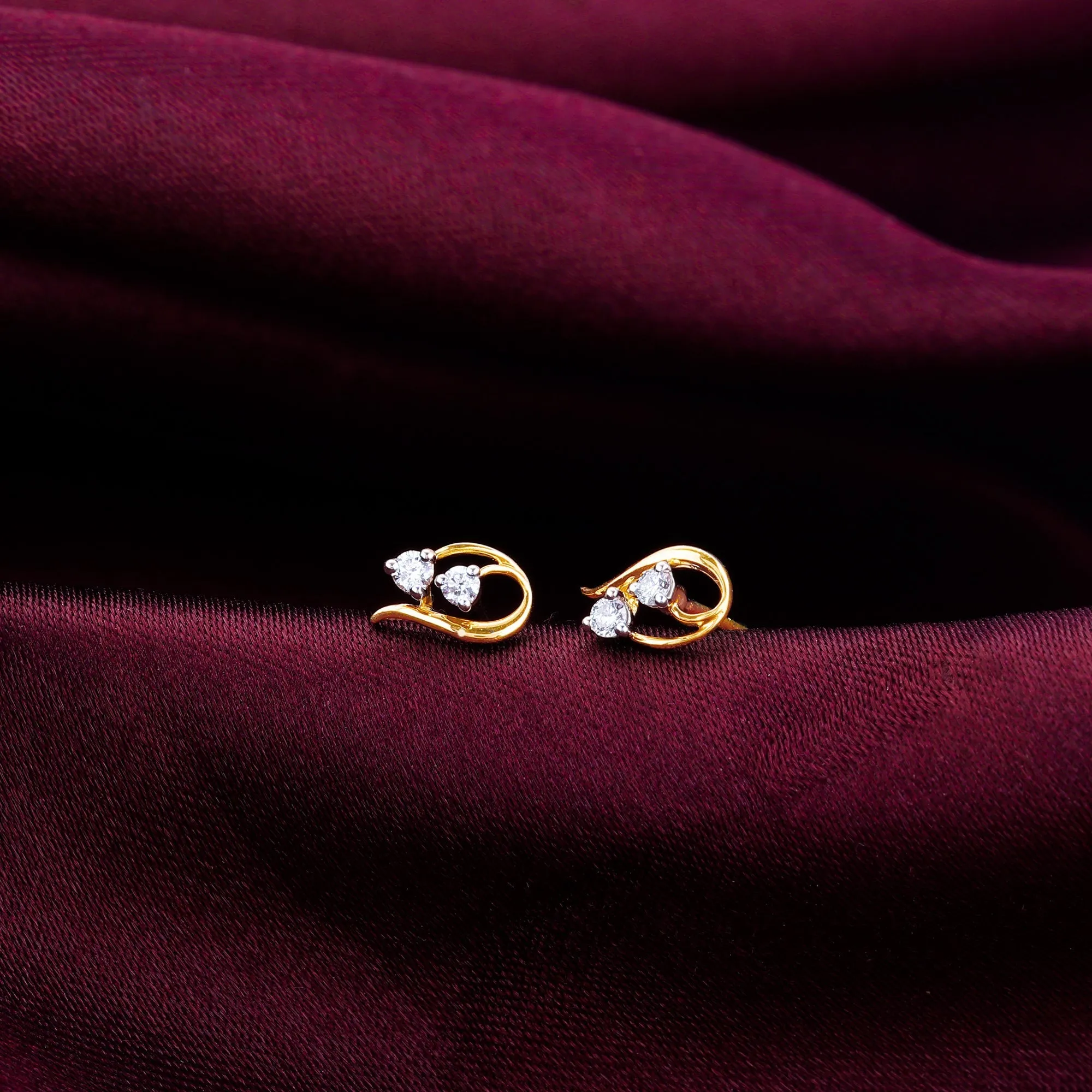 Gold Elegant Twirl Diamond Stud Earrings