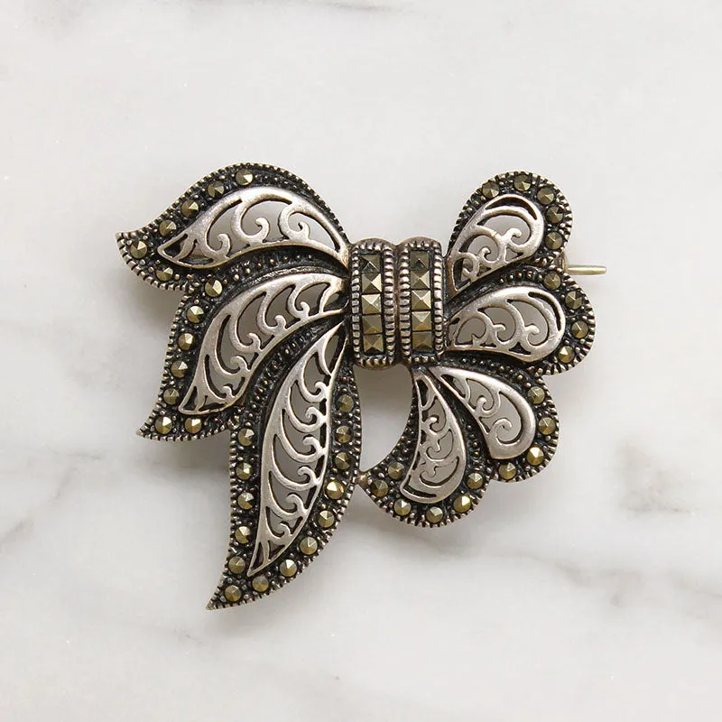 Jaunty 1980s Sterling & Marcasite Bow Brooch